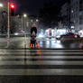 On a cold evening, he waited for the green light
