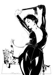 CATWOMAN and a cat playing.