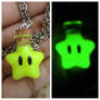 Yellow Mario star glow in the dark necklace