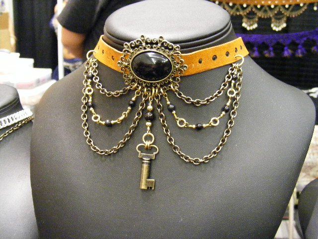 Leather choker with drapes and key