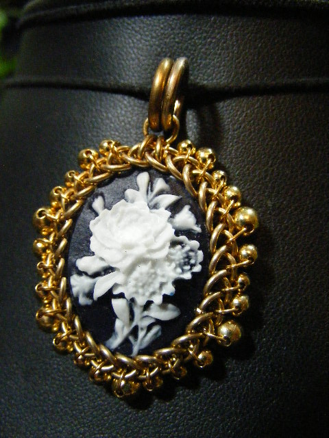 roses in brass cameo