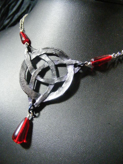 black leather triquetra with red beads