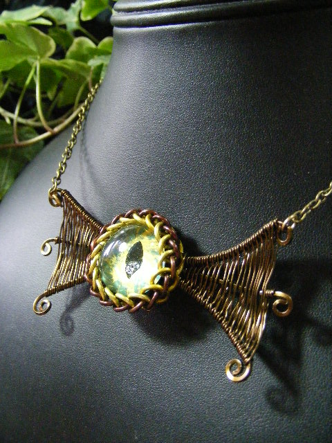 Winged Ice Green And Yellow Eye In Bronze