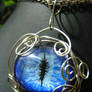 Blue Eye Wire Wrapped Pendant