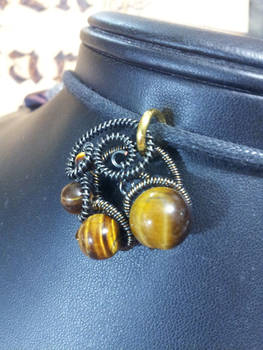 Tigers eye in Gunmetal Coils