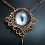 Evening Eye in Brass Coiled Wire with Purple Drop