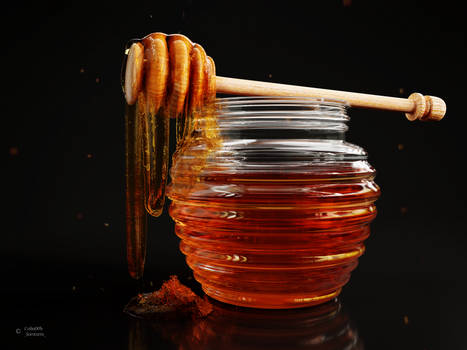 Honey dripping from a Honey Spoon