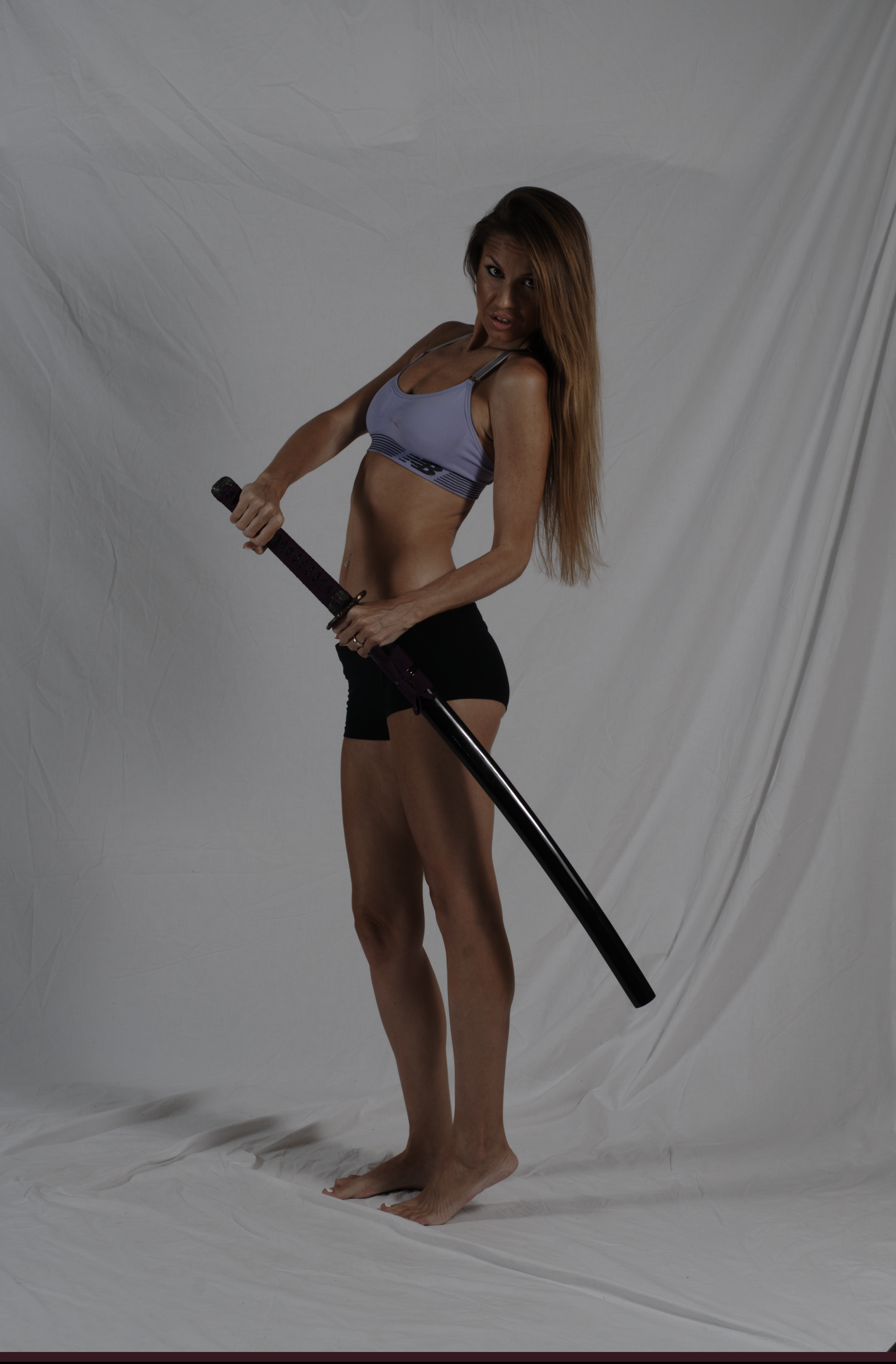 Stephine wielding a katana