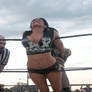 Shelly Martinez stretched on ring ropes