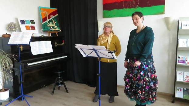 Mathilde and Ingeline singing at their exhibition 