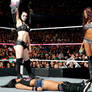 AJ Lee outnumbered and destroyed
