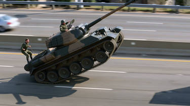 A Panzer Tiger German Tiger Tank Is Driving Down A