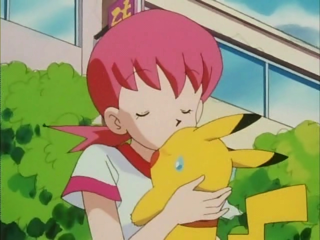 Whitney Picks Pikachu Up And Kisses Him On The Hea