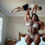 Muscular Woman Lifts a Man