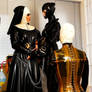 Kneeling before the rubber matron and sister