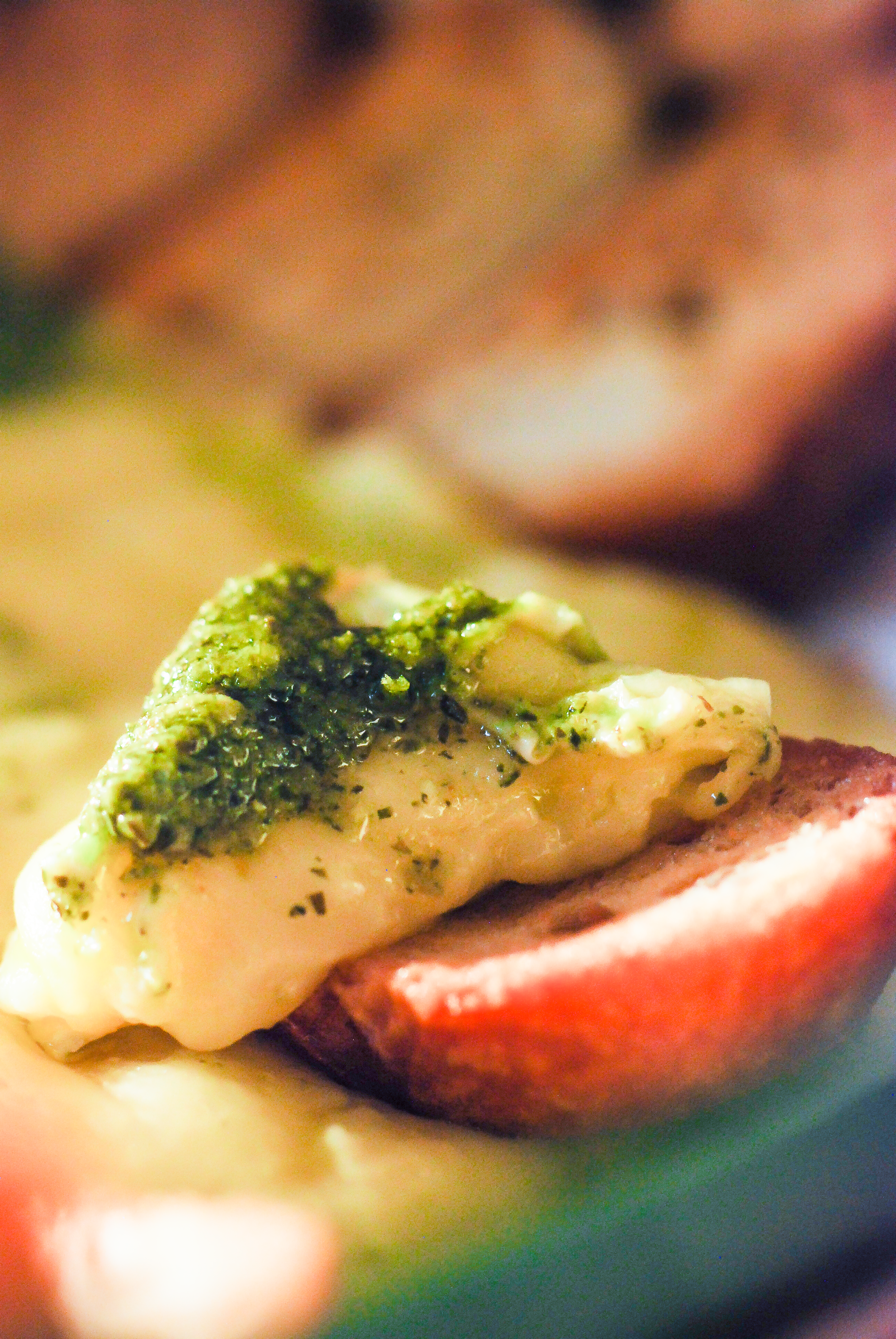 pesto baked Brie on garlic crostini