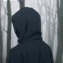 We approach a man in a hood, and he is faceless