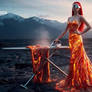 Model woman in hot lava dress, ironing cloth