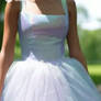 Model woman in holographic pastel dress