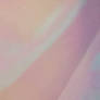 Model woman in holographic pastel dress