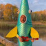 Person in fish costume is singing. Ai video