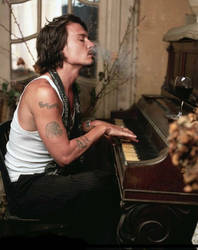 jonny depp playing the piano