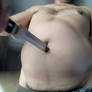 Knife goes all the way inside his belly and moves