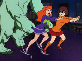 Redhead and brunette try to break free from monste