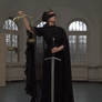 Stock - Justicia blind with sword looks away