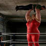 Female Wrestler Overhead Lift Man