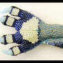 Beadwork paw with claws.