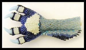 Beadwork paw with claws.