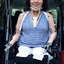 Quad Amputee w/ Hooks Wheelchair and Brace
