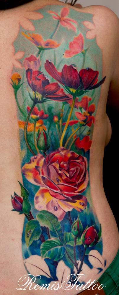 realistic color tattoo of flowers by Remistattoo