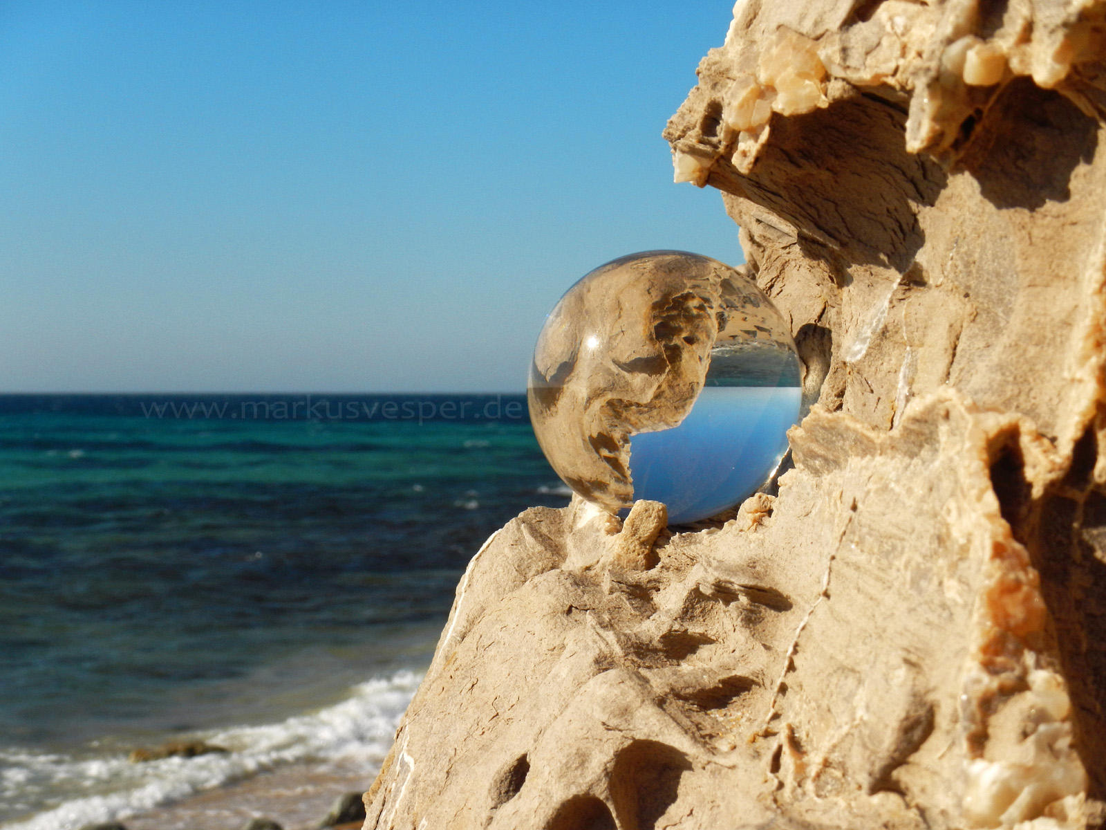 Glass sphere at the coast by Acrylicdreams