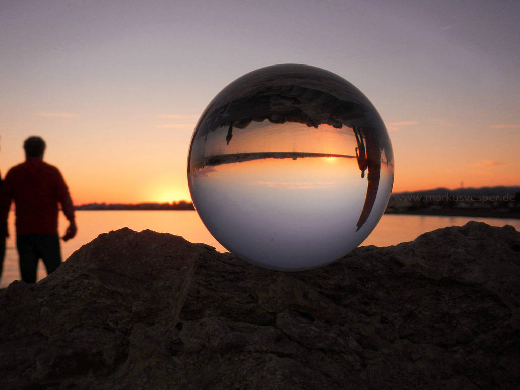 Upside down sunset in crystal ball by Acrylicdreams