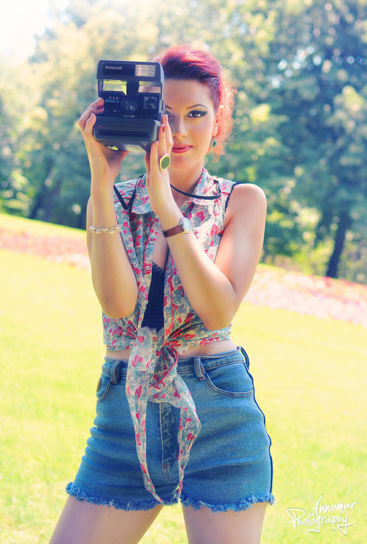 Girl with camera by AnnOmar