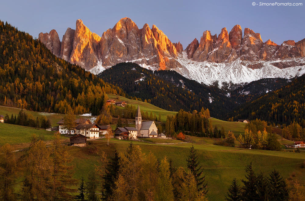 Alpine village in autumn by SimonePomata