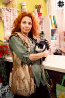 Cat among flowers - The flower shop owner I by nellasgraphics