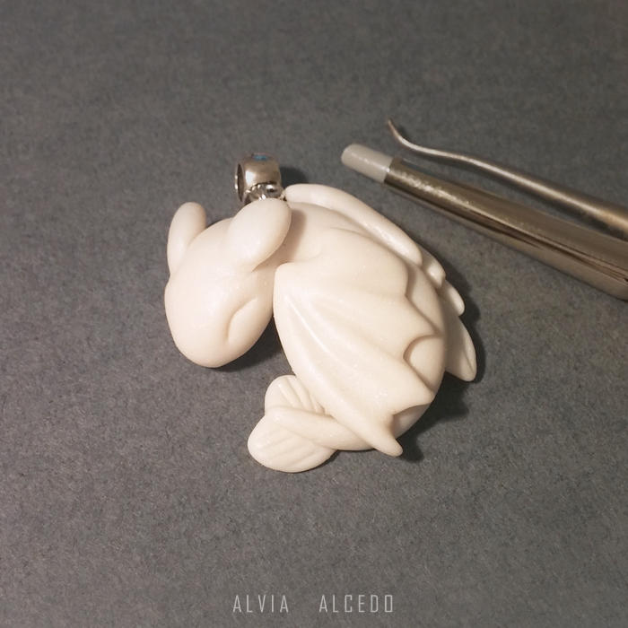 Tiny White Fury pendant by AlviaAlcedo