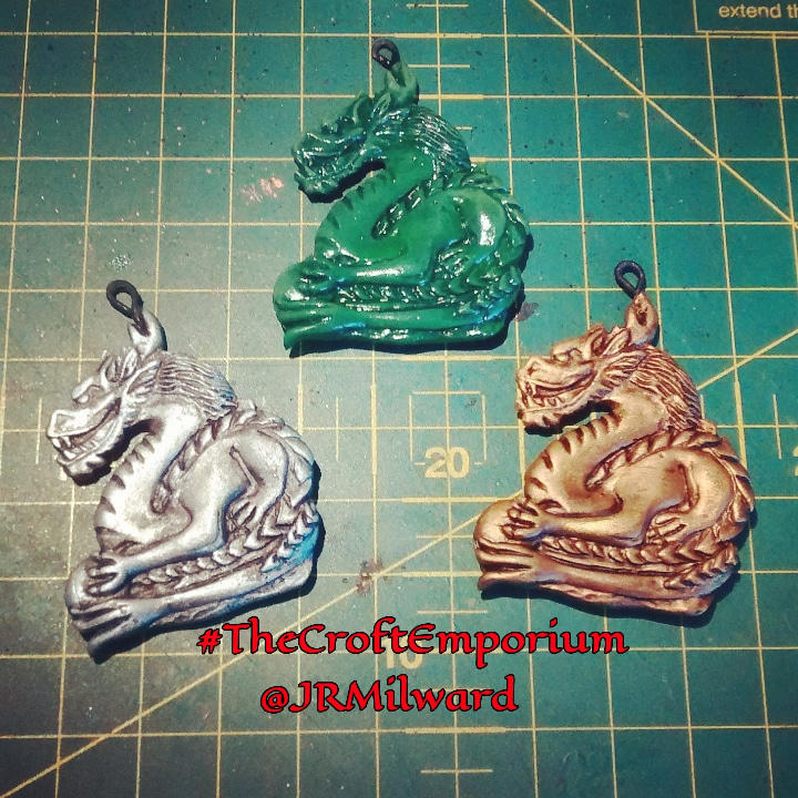 Secret Dragon-inspired pendants by Greenkey2