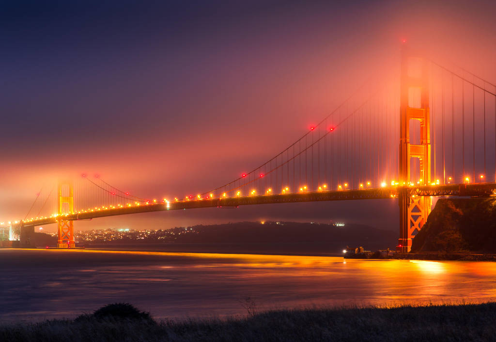 Golden Gate Bridge on a Foggy 4th of July Night by Xyclopx