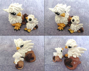 Mama and Baby Gryphon by DragonsAndBeasties Mama and Baby Gryphon by DragonsAndBeasties