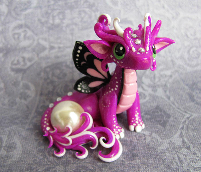 Baby Butterfly Dragon by DragonsAndBeasties