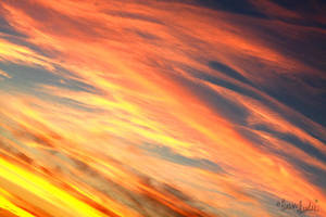 Cirrus Ablaze by FramedByNature