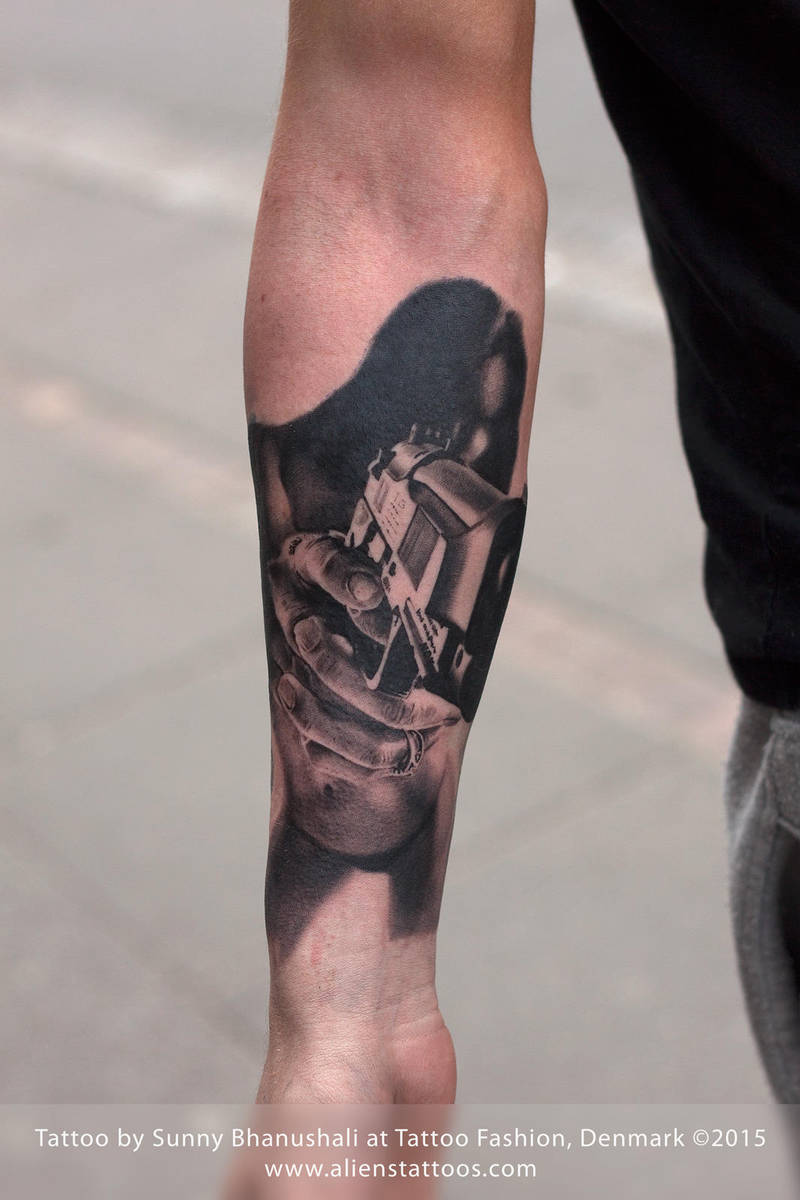Girl with Gun Tattoo by Javagreeen