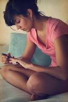 Painting her fingernails by borisabaunza