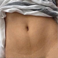 18 yr girl's belly button by EroticLifeStyle