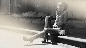 Woman Sitting on the street by WizardLoveMagic