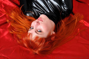 Red Head in Black Latex by ilovefrenchgirls